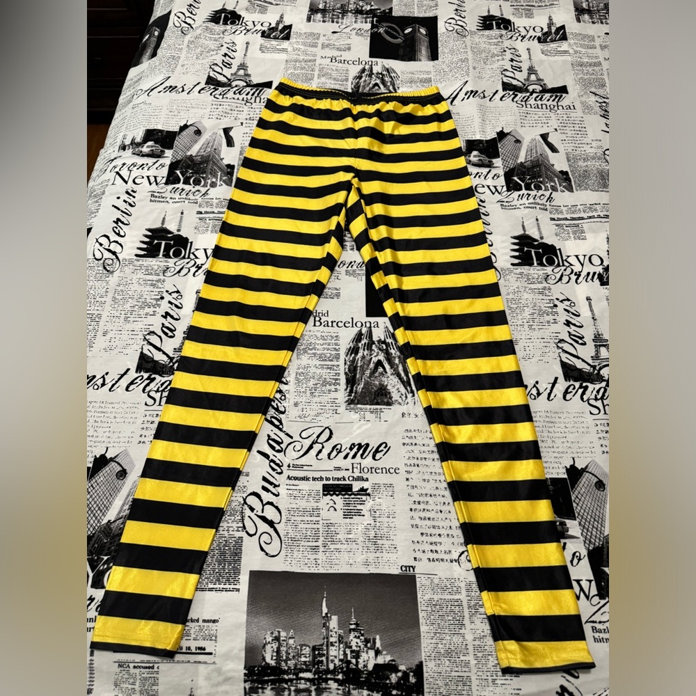 Yellow and Black striped leggings in medium